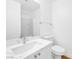 Bright bathroom features a modern vanity with a sink and a large mirror at 9017 Becoming Ct, Las Vegas, NV 89149