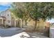 Charming home with a front yard tree offering shade and curb appeal at 9017 Becoming Ct, Las Vegas, NV 89149