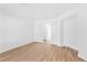 Spacious living room featuring hardwood floors and white walls at 9017 Becoming Ct, Las Vegas, NV 89149