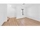 Minimalist living room featuring hardwood floors and a bright window at 9017 Becoming Ct, Las Vegas, NV 89149