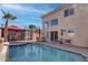 Stunning backyard oasis with pool, spa, cabana, and outdoor dining area at 9680 Granite Gorge Ct, Las Vegas, NV 89148