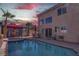 Stunning backyard oasis with pool, spa, cabana, and outdoor dining area at 9680 Granite Gorge Ct, Las Vegas, NV 89148