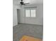 Clean bedroom features neutral walls, carpet, and shuttered windows at 9680 Granite Gorge Ct, Las Vegas, NV 89148