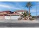 Charming two-story home with well-maintained landscaping and attached two-car garage at 9680 Granite Gorge Ct, Las Vegas, NV 89148