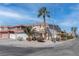 Inviting two-story home featuring lush landscaping, a tile roof, and a spacious two-car garage at 9680 Granite Gorge Ct, Las Vegas, NV 89148