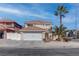 Charming two-story home with a well-maintained front yard and a two-car garage at 9680 Granite Gorge Ct, Las Vegas, NV 89148