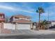 Charming two-story home with well-maintained landscaping and attached two-car garage at 9680 Granite Gorge Ct, Las Vegas, NV 89148