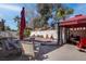 Backyard with a pool, a hot tub and patio dining set with a gazebo at 9680 Granite Gorge Ct, Las Vegas, NV 89148