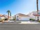 Charming single-story home with desert landscaping and a two-car garage at 9725 Sierra Mesa Ave, Las Vegas, NV 89117