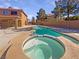 Home pool and jacuzzi with a full outdoor view at 9885 Ramhorn Canyon St, Las Vegas, NV 89183