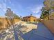 Inviting backyard pool and spa with ample deck space, enclosed by a private stucco wall and mature landscaping at 9885 Ramhorn Canyon St, Las Vegas, NV 89183