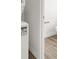 Bathroom with stackable washer/dryer and toilet at 9920 Keephills St, Las Vegas, NV 89183