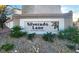 Silverado Lane sign with landscaped rocks and shrubs at 9920 Keephills St, Las Vegas, NV 89183