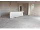Spacious open-concept living room with large windows and a view of the backyard at 10012 River Corral St, Las Vegas, NV 89166
