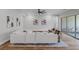 Bright and airy living room with modern decor and hardwood floors at 10065 Auburn Rose Ave, Las Vegas, NV 89143
