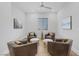 Comfortable sitting room providing an area for conversation at 10065 Auburn Rose Ave, Las Vegas, NV 89143