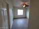 Bedroom featuring wood-look flooring, ceiling fan and natural light at 10134 Reflection Brook Ave, Las Vegas, NV 89148