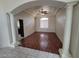 Dining room featuring hardwood floors, columns, and a modern ceiling fan at 10134 Reflection Brook Ave, Las Vegas, NV 89148