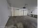 A spacious two car garage with a workbench and plenty of room for storage at 10134 Reflection Brook Ave, Las Vegas, NV 89148