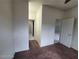Hallway featuring multiple doorways, connecting different rooms and offering a smooth transition at 10134 Reflection Brook Ave, Las Vegas, NV 89148