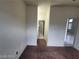 View of a hallway connecting the living spaces, showcasing the home's functional layout at 10134 Reflection Brook Ave, Las Vegas, NV 89148