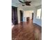 Living room with hardwood flooring and natural light at 10134 Reflection Brook Ave, Las Vegas, NV 89148