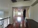 Open living room with wood floors and ample space at 10134 Reflection Brook Ave, Las Vegas, NV 89148