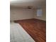 Bright living area with wood floors, neutral paint, and natural light at 10134 Reflection Brook Ave, Las Vegas, NV 89148