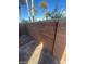 A private patio area is enclosed by a brick wall, offering a serene outdoor space at 10134 Reflection Brook Ave, Las Vegas, NV 89148