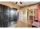 Bedroom features include wood floor, closet, ceiling fan and access to the other rooms at 10532 Beachwalk Pl, Las Vegas, NV 89144