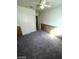 Bedroom with paneled accent wall, closet, and a ceiling fan at 1213 Daytona Ln, Las Vegas, NV 89117