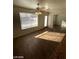 Bright dining area featuring backyard views from the window and wood-style tile flooring at 1213 Daytona Ln, Las Vegas, NV 89117