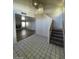 Welcoming entryway with tile flooring, stairs to the upper level, and an open view to the living room at 1213 Daytona Ln, Las Vegas, NV 89117
