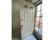 Open front door showcasing a bright and airy entrance with tiled flooring and natural light at 1213 Daytona Ln, Las Vegas, NV 89117