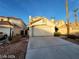 Charming single-Gathering home featuring a two-car garage and well-maintained desert landscaping at 1213 Daytona Ln, Las Vegas, NV 89117