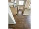 Bright kitchen with wood floors, light cabinets, and granite countertops at 1213 Daytona Ln, Las Vegas, NV 89117