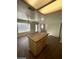 Kitchen island with granite countertops offers backyard views from the window above the sink at 1213 Daytona Ln, Las Vegas, NV 89117