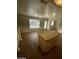 Kitchen island with granite countertops offers backyard views from the window above the sink at 1213 Daytona Ln, Las Vegas, NV 89117