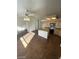 Kitchen with a large center island and seamless flow into living area at 1213 Daytona Ln, Las Vegas, NV 89117