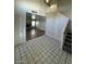 Bright living room featuring tile floors, fireplace, and chandelier lighting at 1213 Daytona Ln, Las Vegas, NV 89117