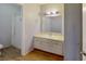 An open-concept bathroom shows a vanity and shower stall at 1405 Vegas Valley Dr # 306, Las Vegas, NV 89169