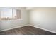 Cozy bedroom featuring durable laminate flooring, creating a warm and inviting atmosphere at 1405 Vegas Valley Dr # 306, Las Vegas, NV 89169