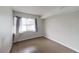 A cozy bedroom features natural light and hardwood floors at 1405 Vegas Valley Dr # 306, Las Vegas, NV 89169