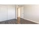 Bedroom featuring laminate floors and a closet with sliding doors at 1405 Vegas Valley Dr # 306, Las Vegas, NV 89169