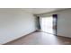A bright bedroom boasts a sliding glass door to a balcony at 1405 Vegas Valley Dr # 306, Las Vegas, NV 89169