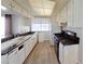 A functional kitchen featuring essential appliances and ample countertop space for meal preparation at 1405 Vegas Valley Dr # 306, Las Vegas, NV 89169
