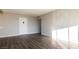 A bright living room featuring attractive laminate flooring and a neutral color palette at 1405 Vegas Valley Dr # 306, Las Vegas, NV 89169
