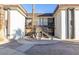 Bright living room featuring a balcony, gray walls, and hard surface flooring at 1405 Vegas Valley Dr # 306, Las Vegas, NV 89169