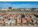 Overhead view of neighborhood homes with solar panels and city skyline backdrop at 1908 Morro Vista Dr, Las Vegas, NV 89135