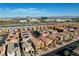 Stunning aerial view of a vibrant community with nearby commercial areas at 1908 Morro Vista Dr, Las Vegas, NV 89135